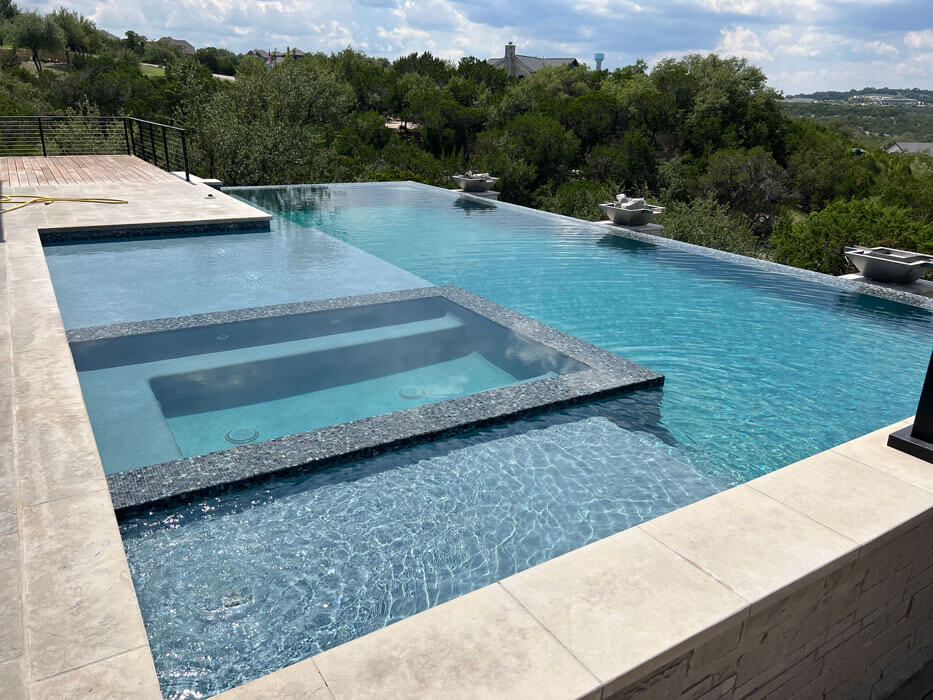 luxury outdoor infinity pool overlooking hillside