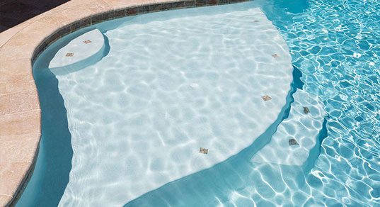 depiction of various steps in a pool showcasing how the color of the water changes